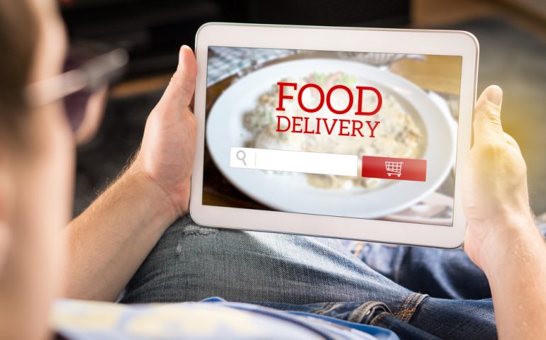 ipad user orders food delivery online