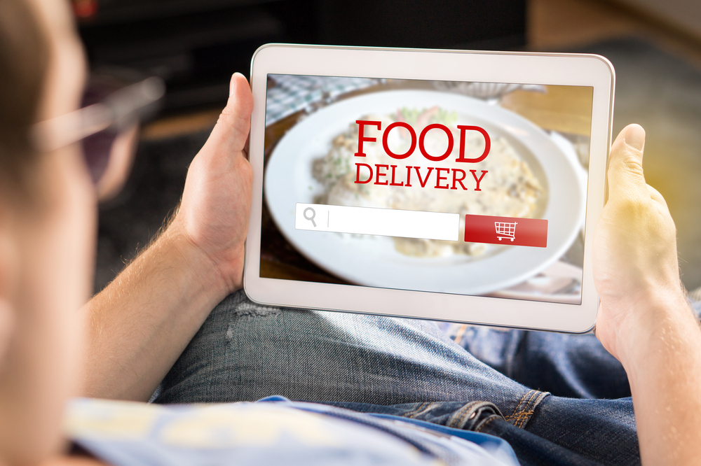 ipad user orders food delivery online